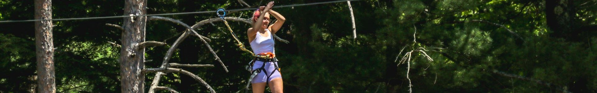 a single girl in the treetop course