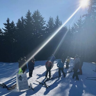 Skiers gather trailside for Alpine Church service