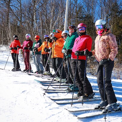 Gunstock Ladies Love Winter participants lined up for a lesson