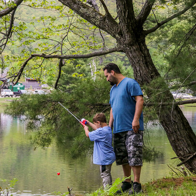 Dad and son fishing at Gunstock