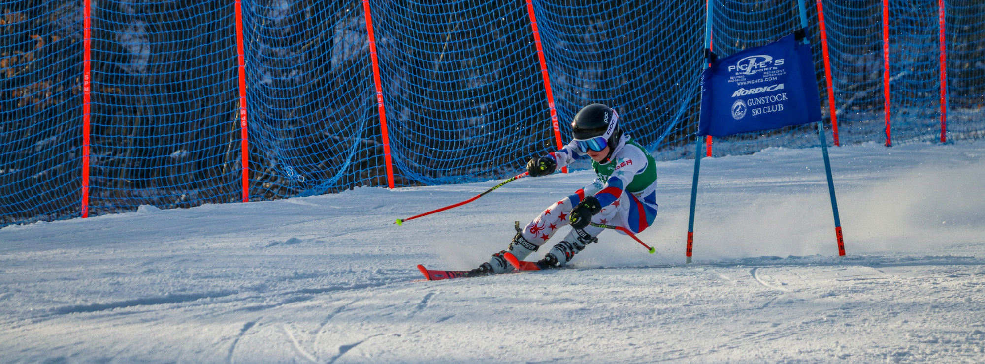 Skier races through a slalom course