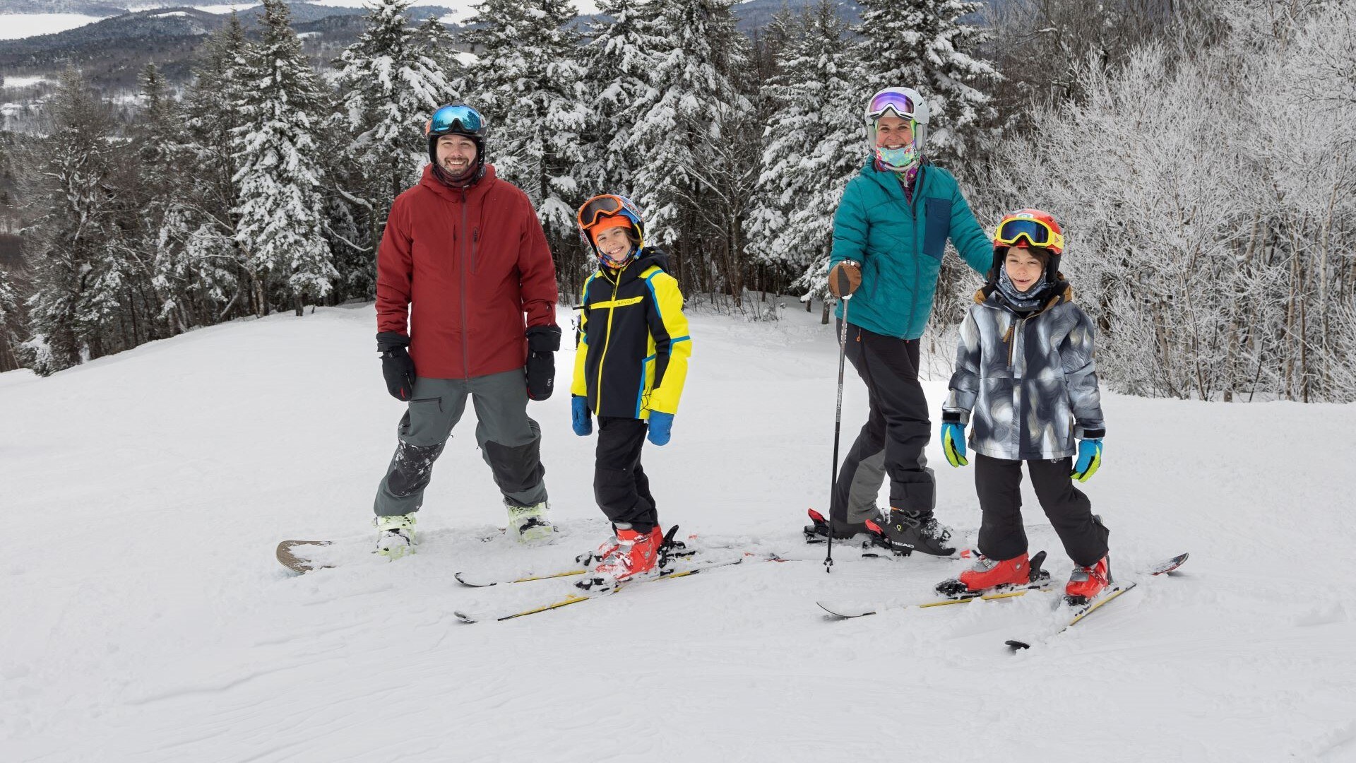 A family skiing at Gunstock