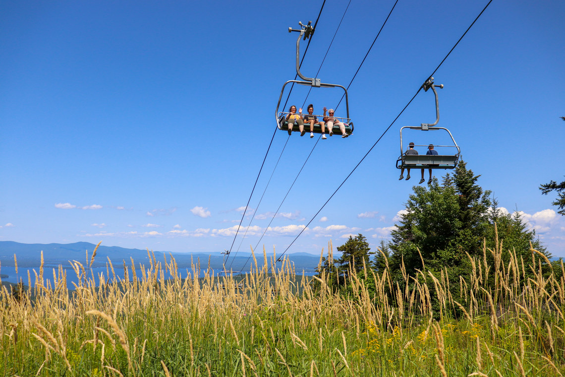 Guests on Panorama chairlift at the summit.