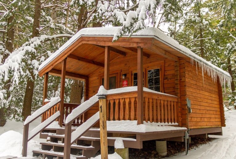 One of two rustic cabins overnight visitors can rent in winter or summer
