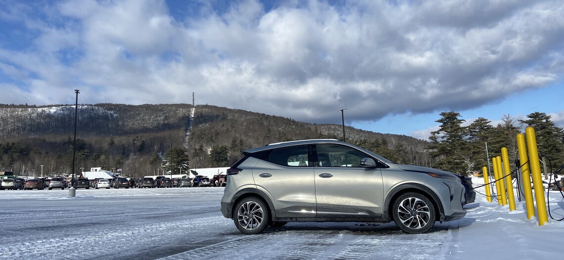 Electric vehicles charging at Gunstock's new EV charging stations.